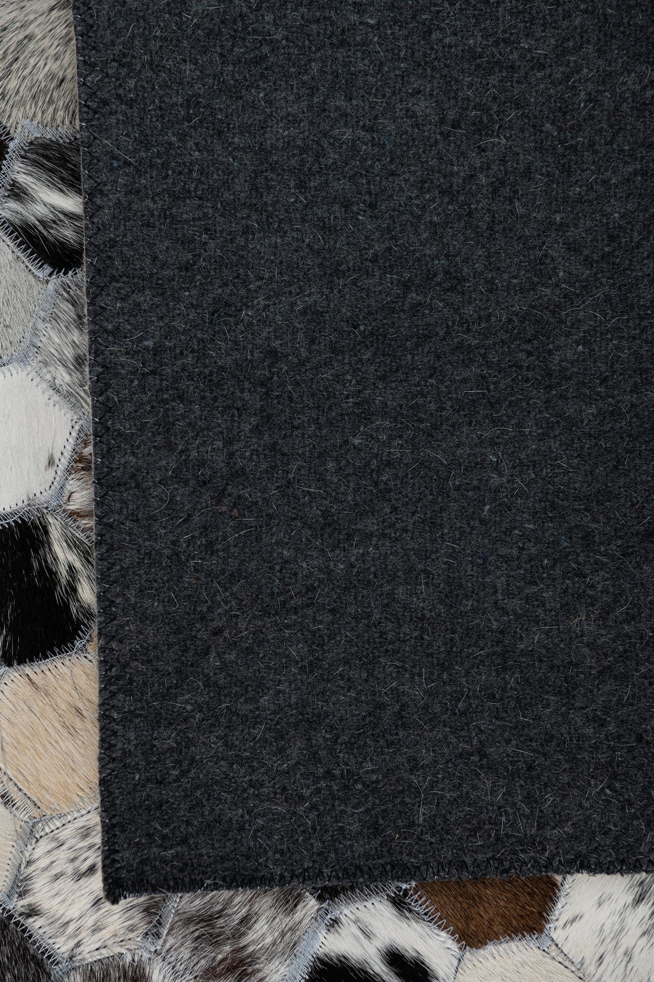 5' 4 x 8' Cowhide Leather Rug