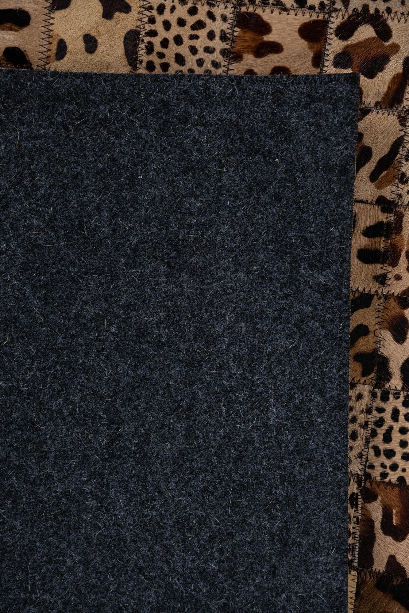 5' 1 x 7' 10 Cowhide Leather Rug