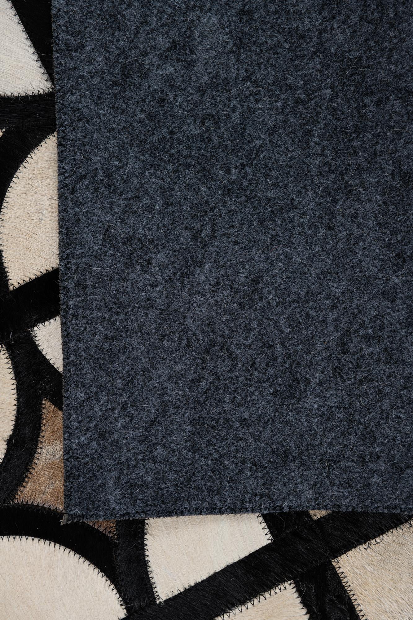 5' 3 x 8' Cowhide Leather Rug