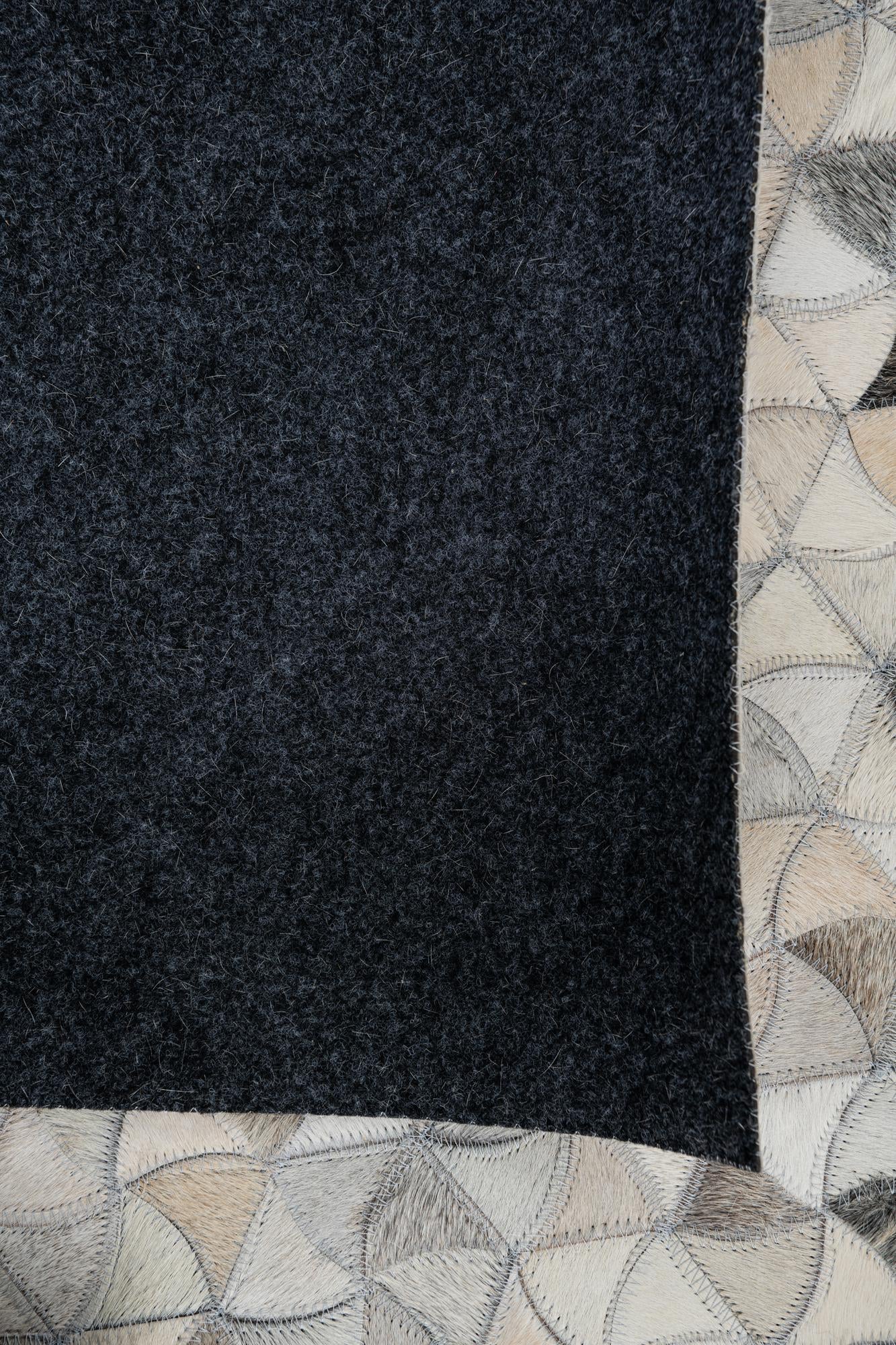5' 1 x 7' 10 Cowhide Leather Rug