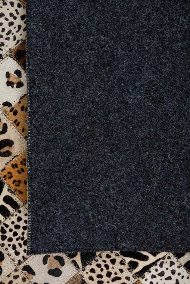 Detail image of 5' 1 x 8' Cowhide Leather Rug