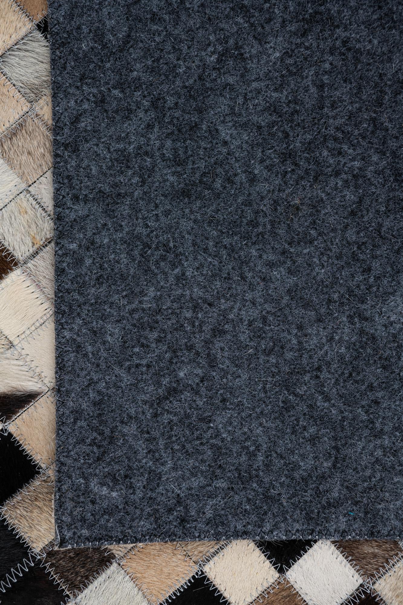 5' 1 x 7' 10 Cowhide Leather Rug