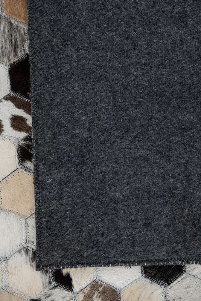 5' 1 x 8' 2 Cowhide Leather Rug