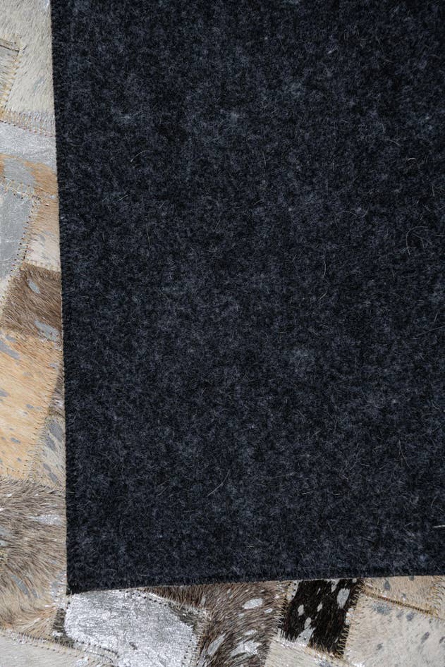 Detail image of 5' x 7' 10 Cowhide Leather Rug