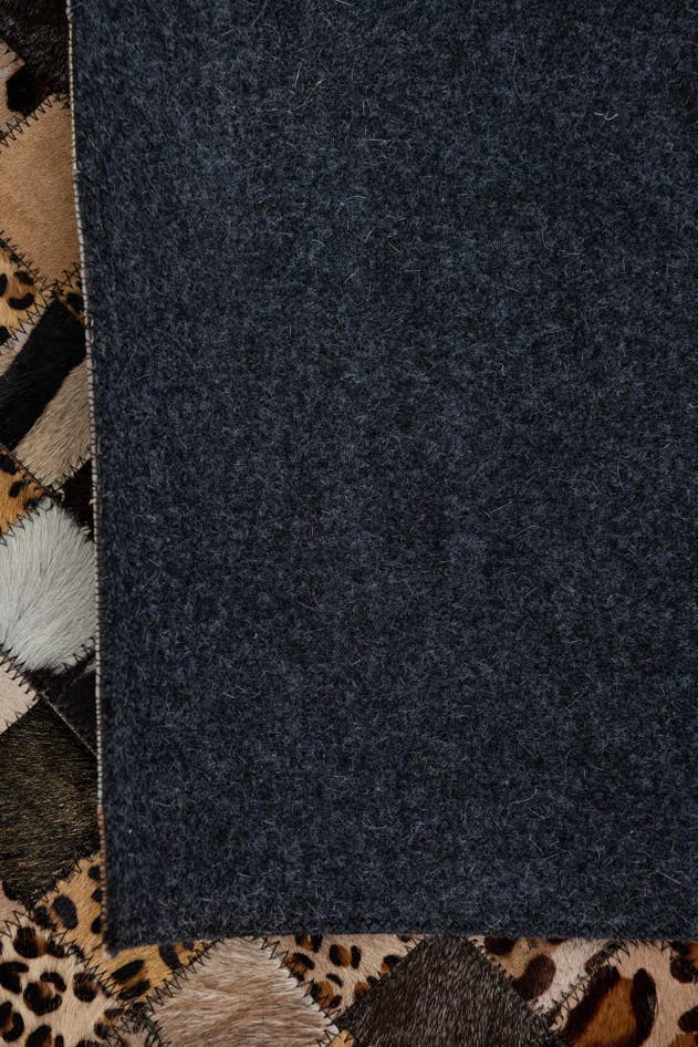 Detail image of 5' 1 x 8' Cowhide Leather Rug