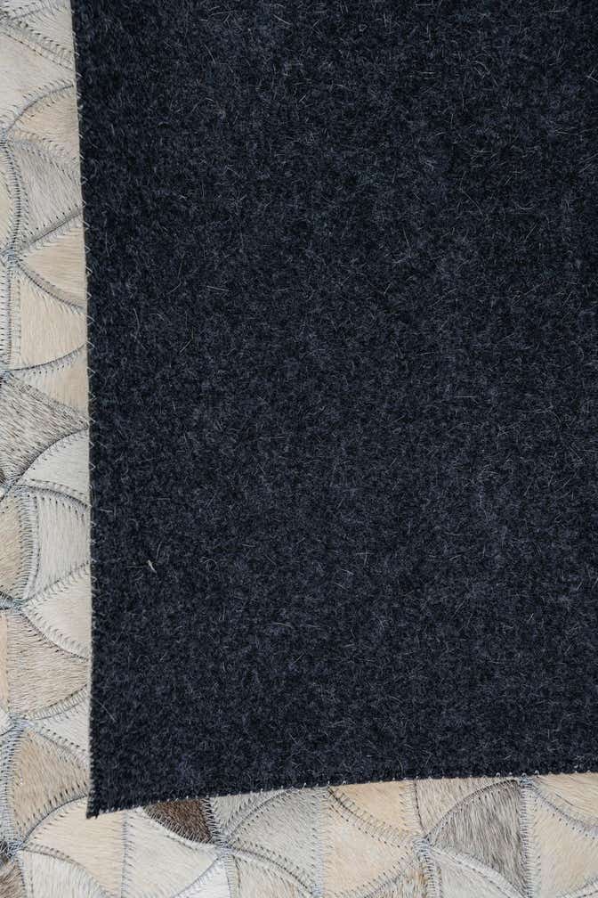 5' 1 x 7' 10 Cowhide Leather Rug