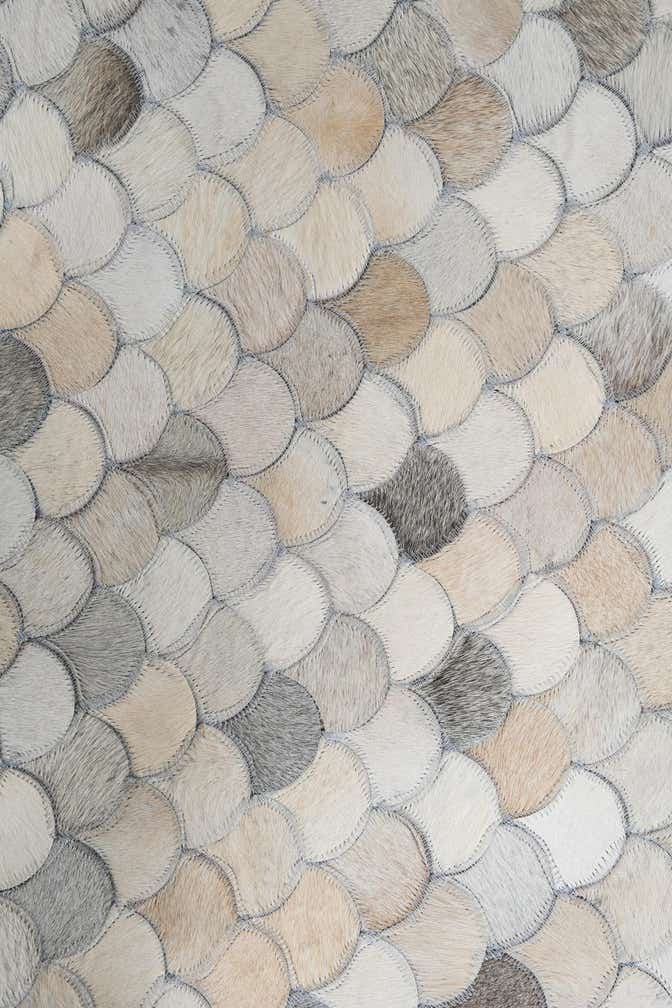 5' 2 x 8' 1 Cowhide Leather Rug