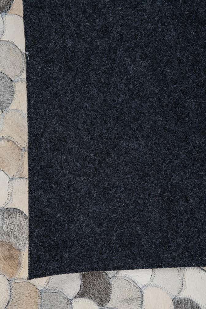 5' 2 x 8' 1 Cowhide Leather Rug