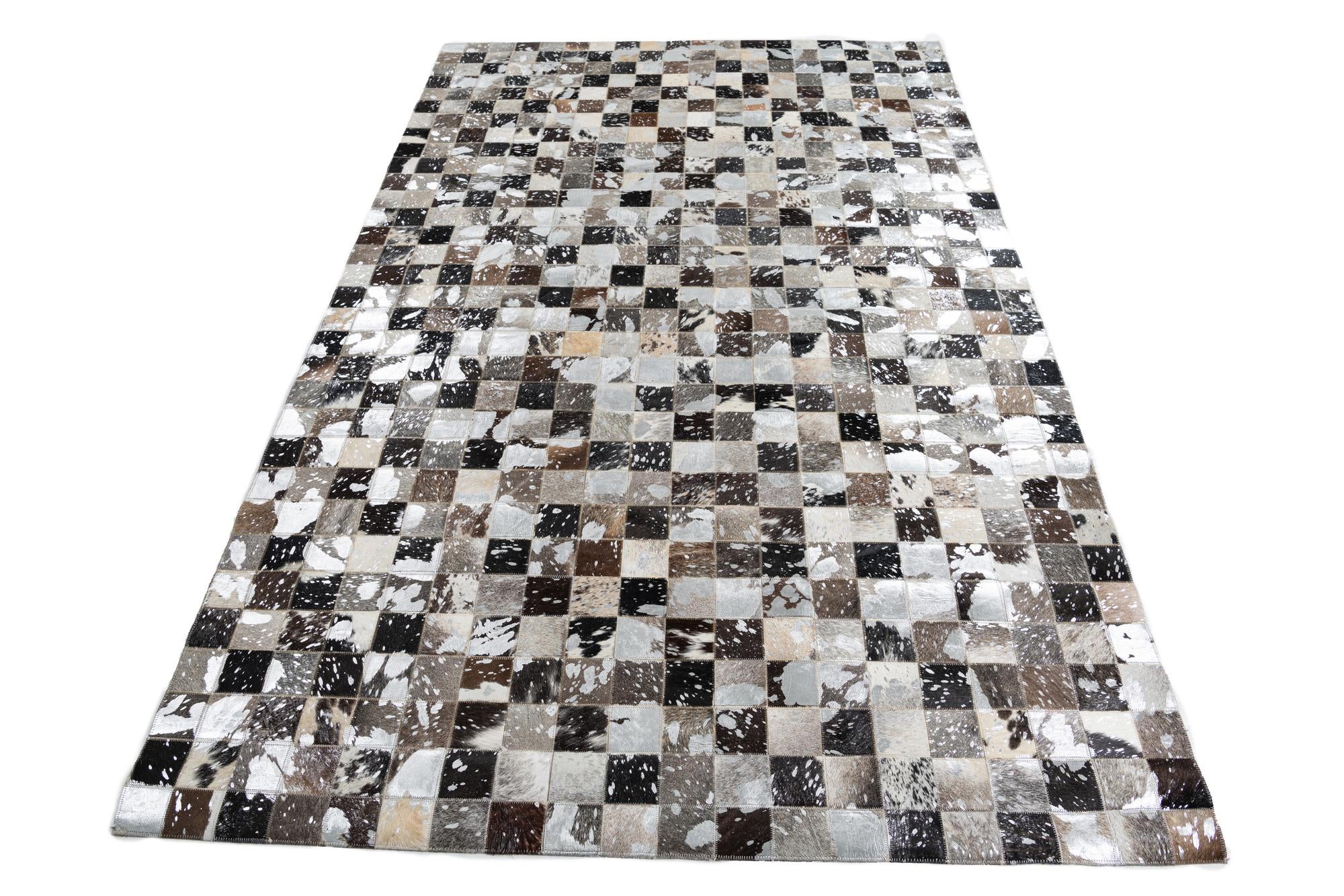 5' 1 x 8' 1 Cowhide Leather Rug