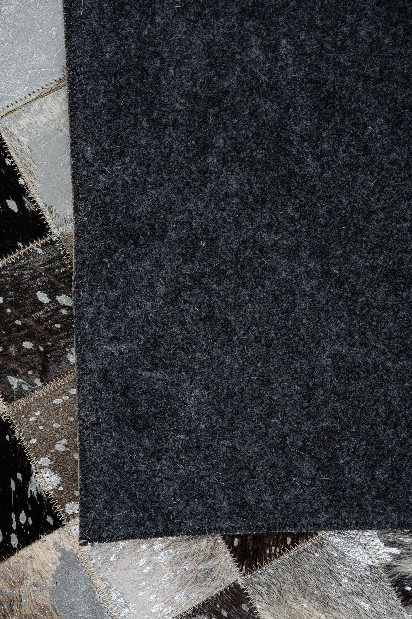 5' 1 x 8' 1 Cowhide Leather Rug