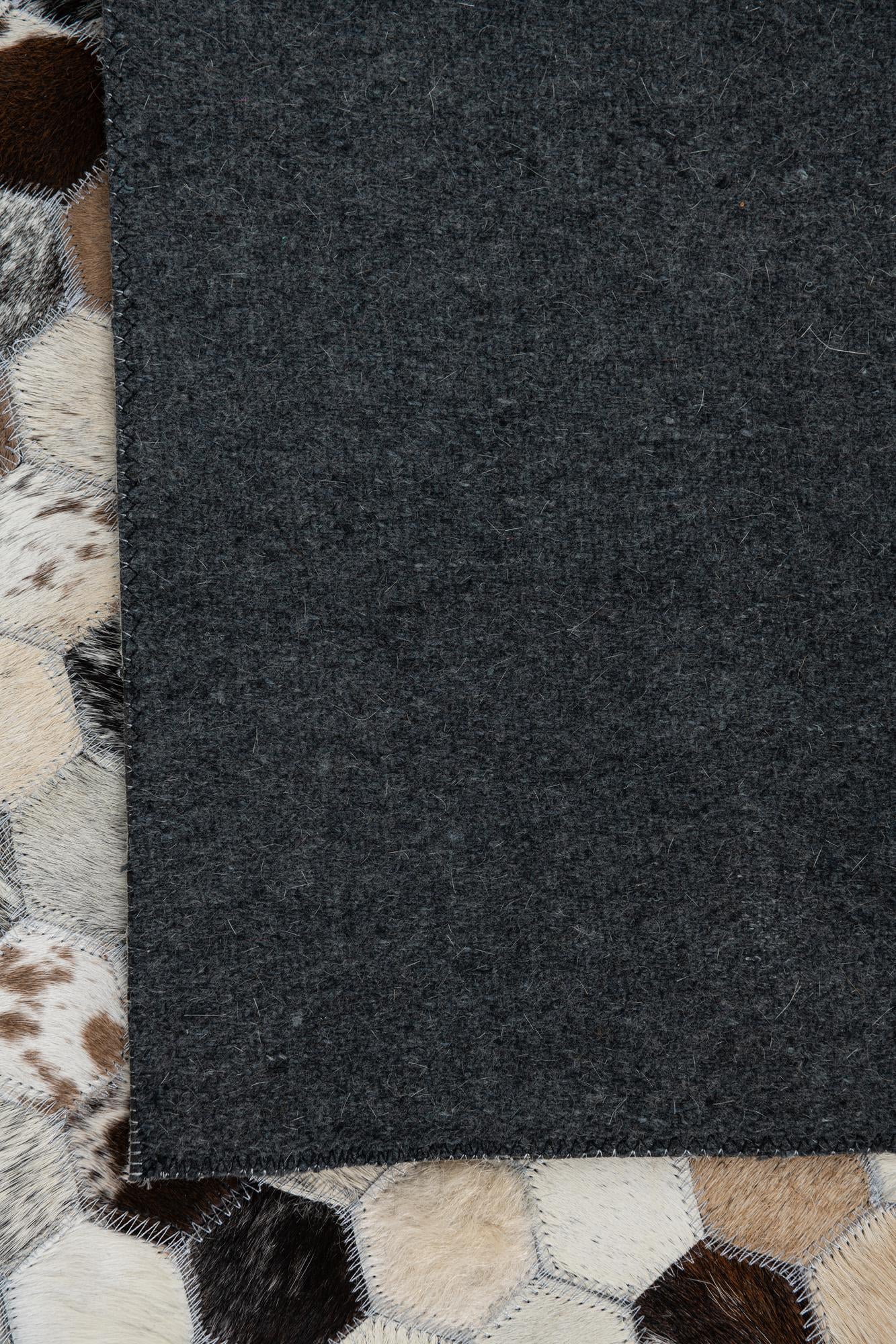 5' 1 x 7' 10 Cowhide Leather Rug