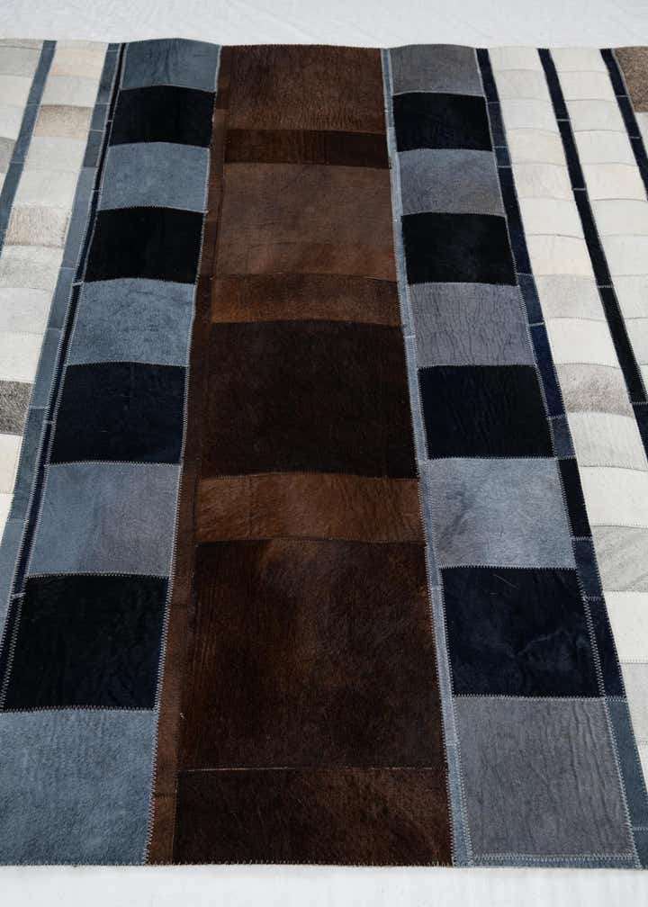 5' 1 x 7' 10 Cowhide Leather Rug