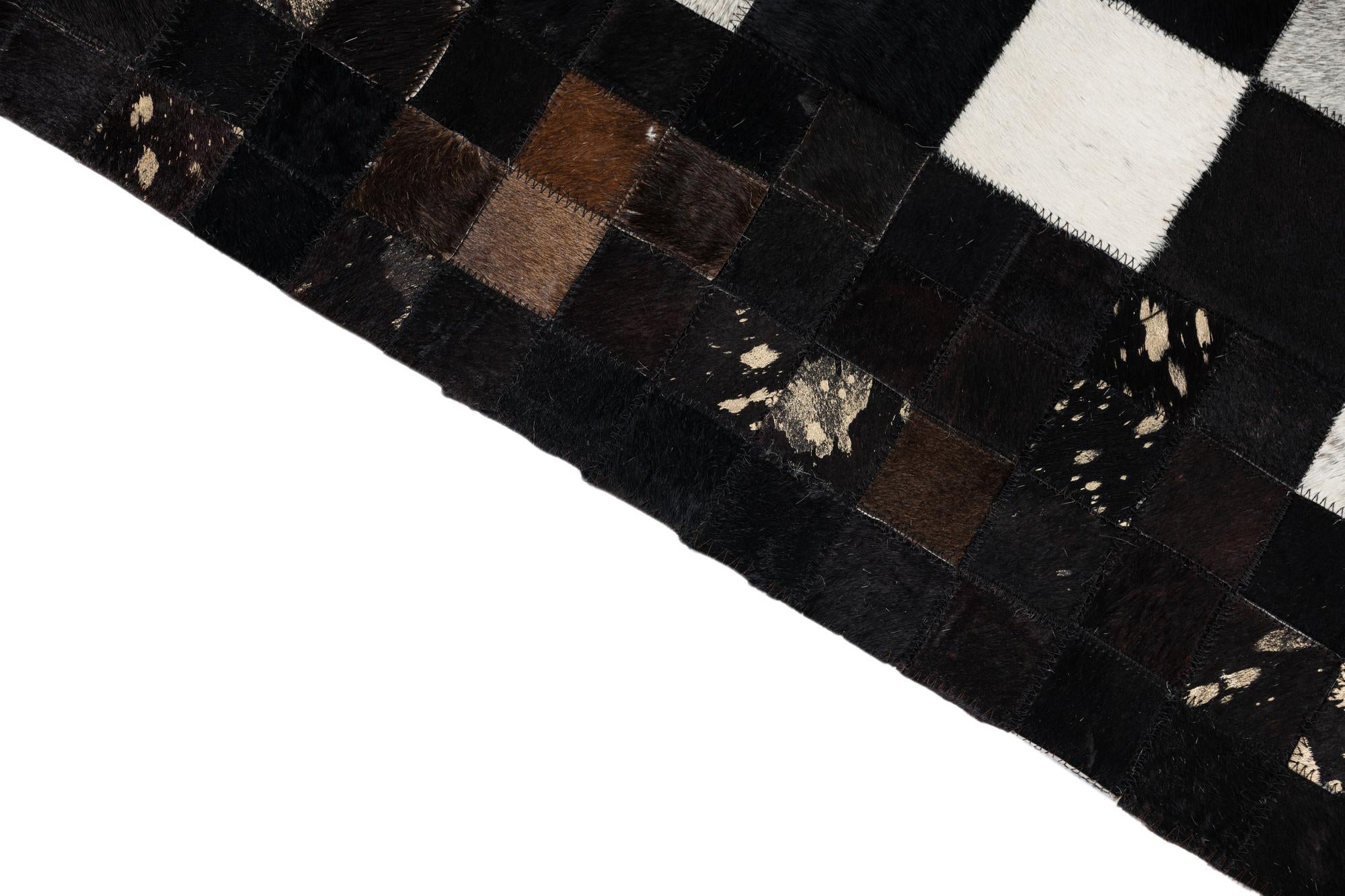 5' x 7' 9 Cowhide Leather Rug