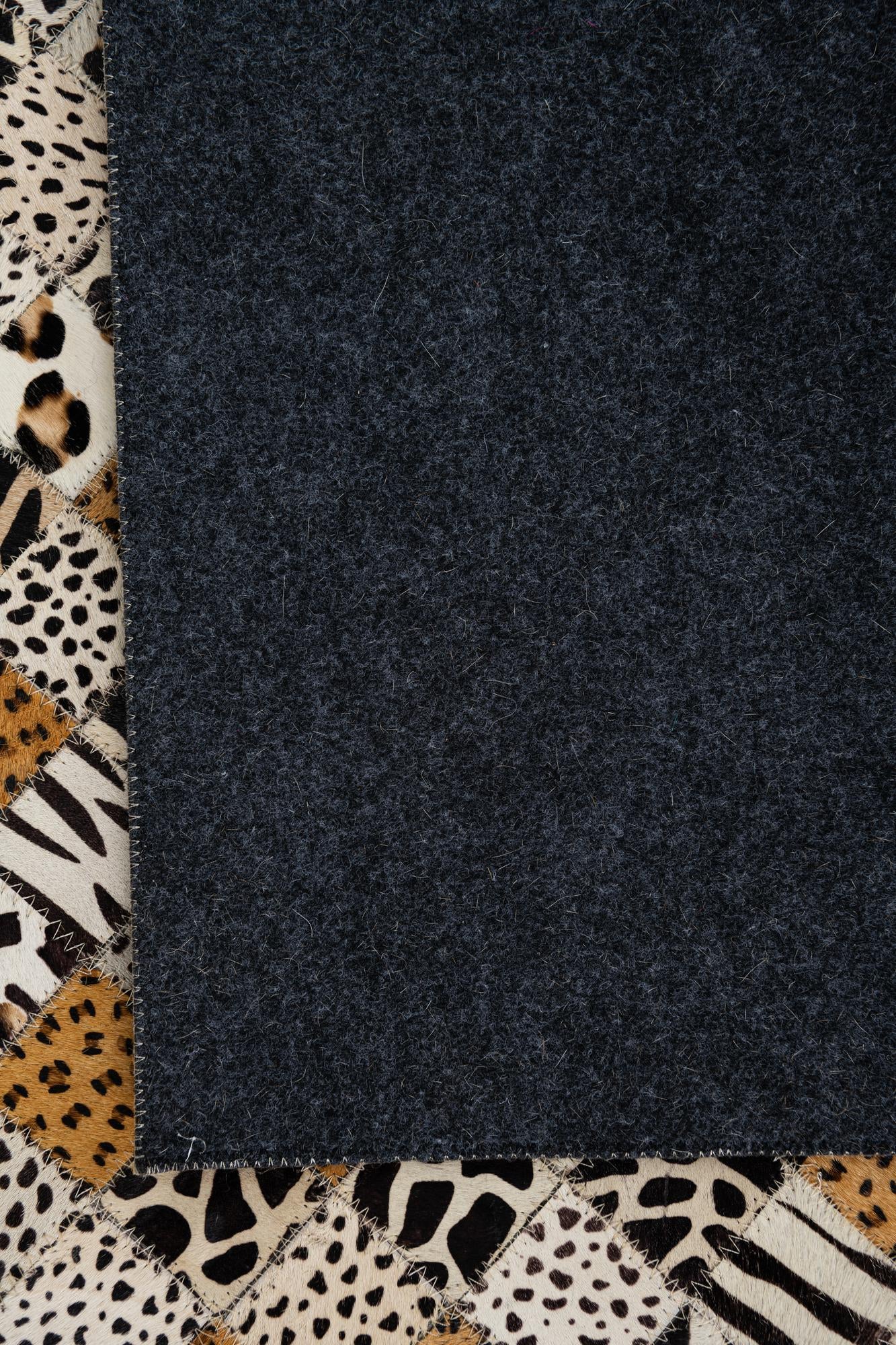 5' 1 x 8' 1 Cowhide Leather Rug