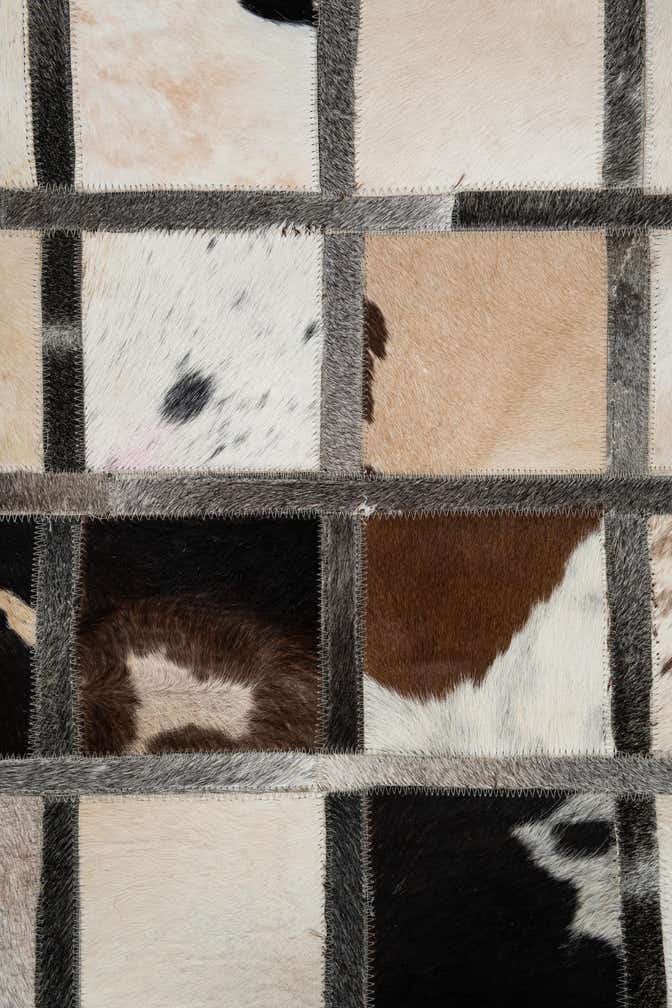5' 1 x 7' 10 Cowhide Leather Rug