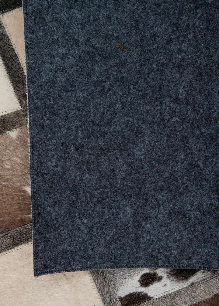 5' 1 x 7' 10 Cowhide Leather Rug