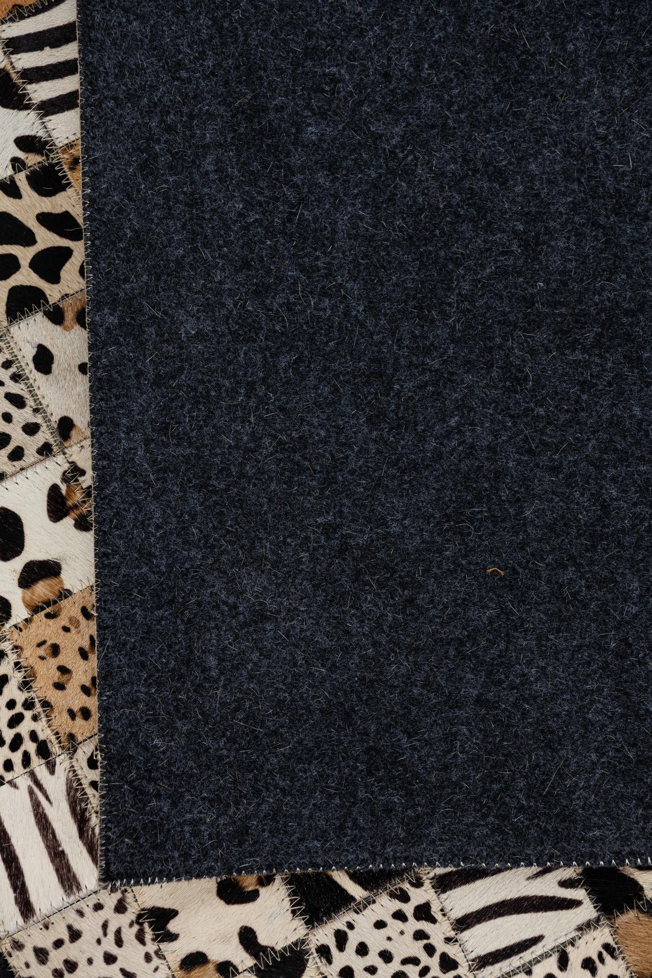 5' 1 x 8' 1 Cowhide Leather Rug