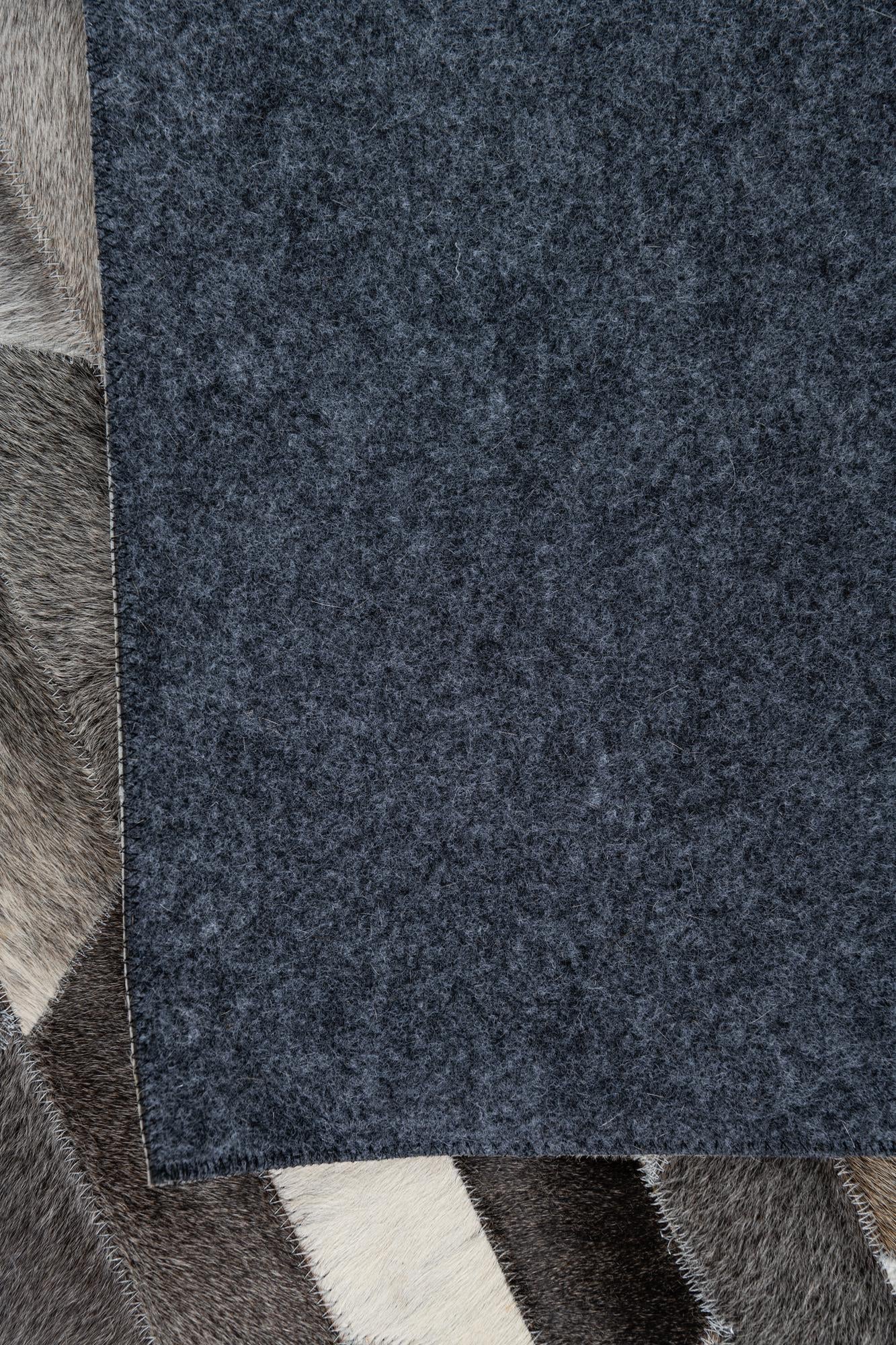 5' 1 x 7' 5 Cowhide Leather Rug