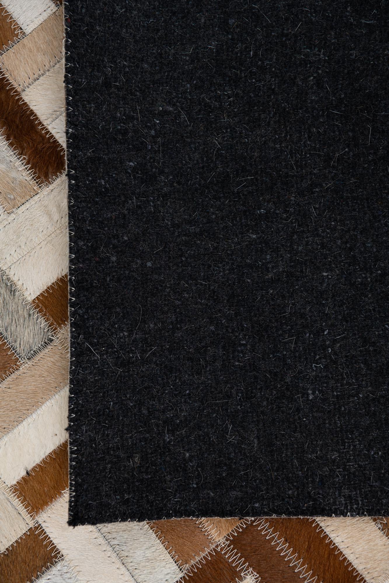 5' 2 x 8' Cowhide Leather Rug