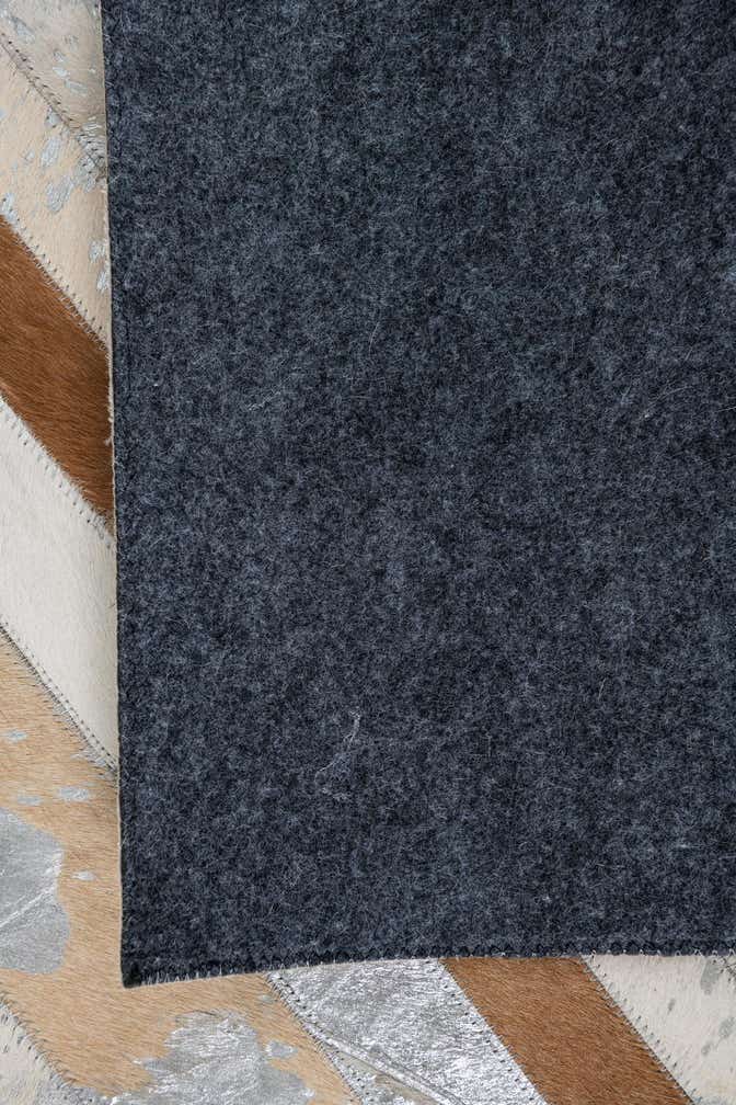5' 1 x 7' 10 Cowhide Leather Rug
