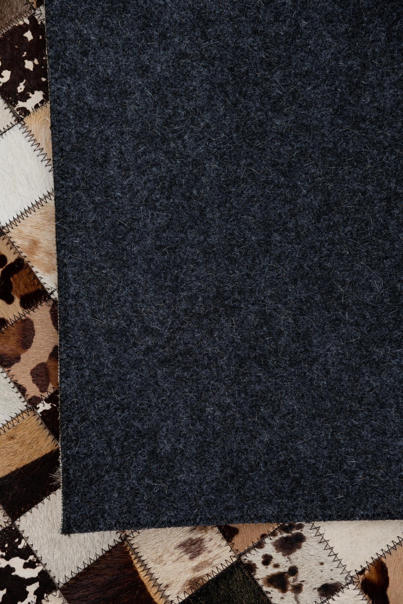 5' 1 x 8' 1 Cowhide Leather Rug
