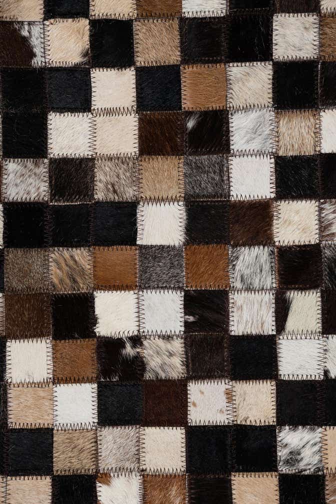 8' 1 x 9' 10 Cowhide Leather Rug