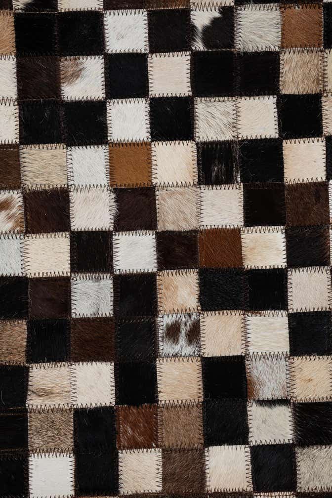 8' 1 x 9' 10 Cowhide Leather Rug