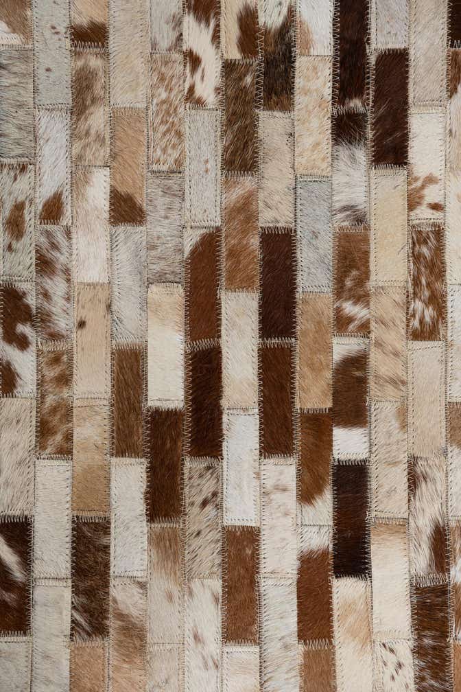 8' 1 x 10' Cowhide Leather Rug