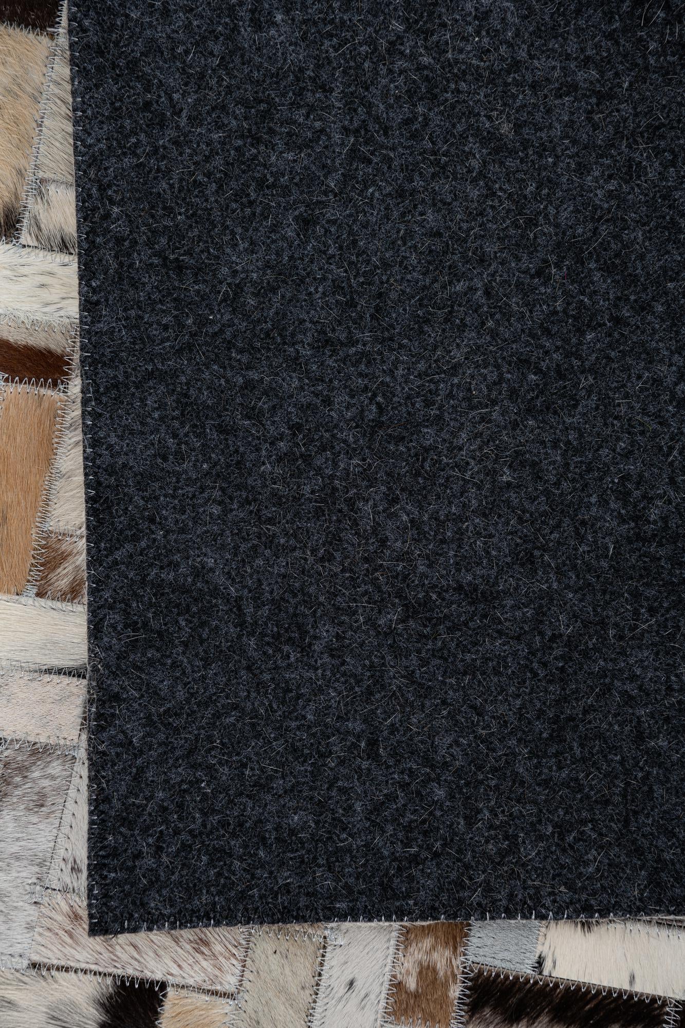 8' 1 x 9' 10 Cowhide Leather Rug