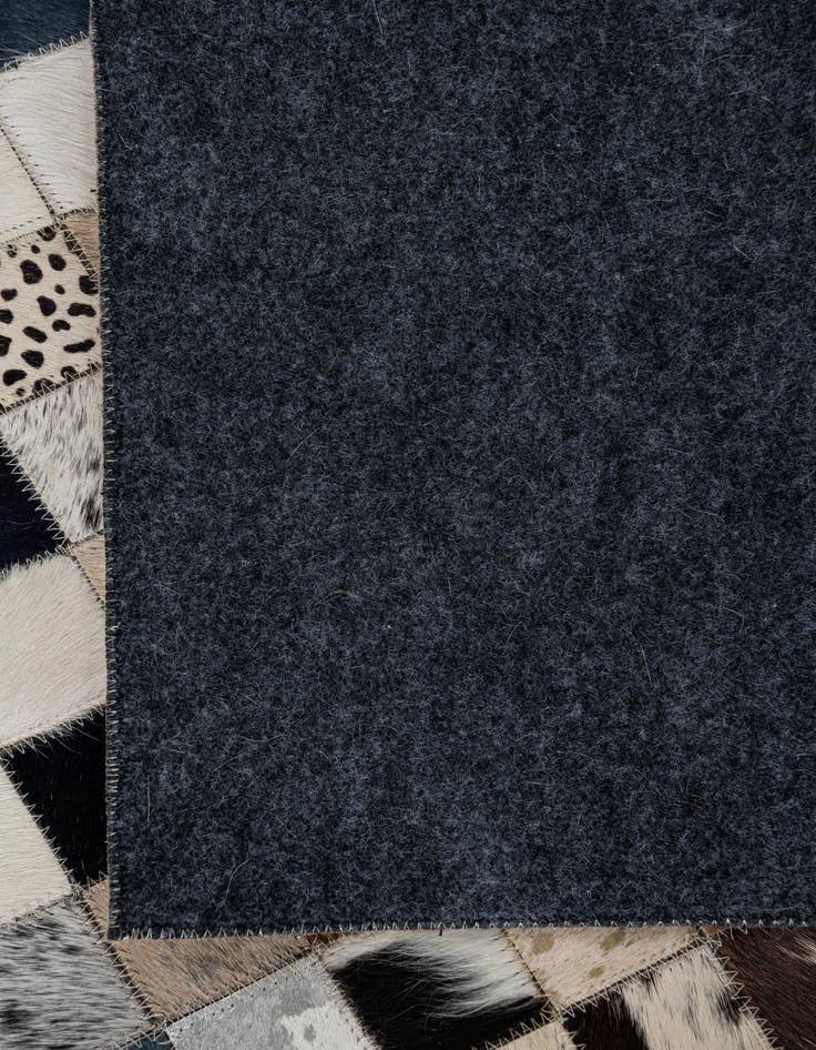 Detail image of 5' 1 x 8' Cowhide Leather Rug