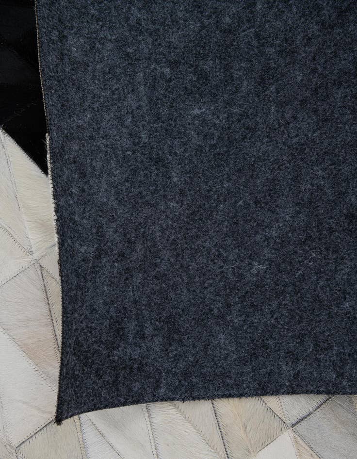 Detail image of 5' x 7' 10 Cowhide Leather Rug