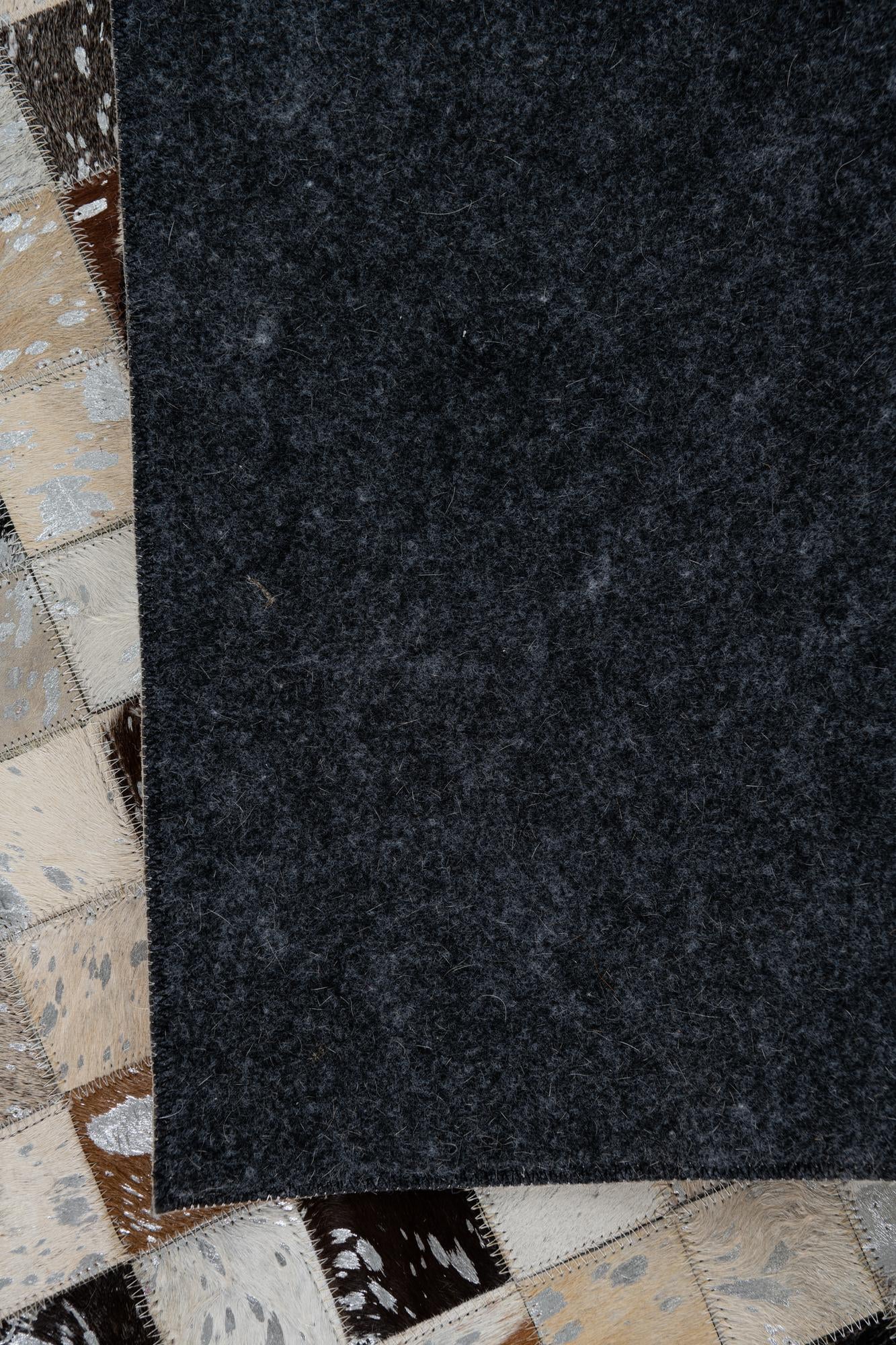 5' 1 x 8' 1 Cowhide Leather Rug