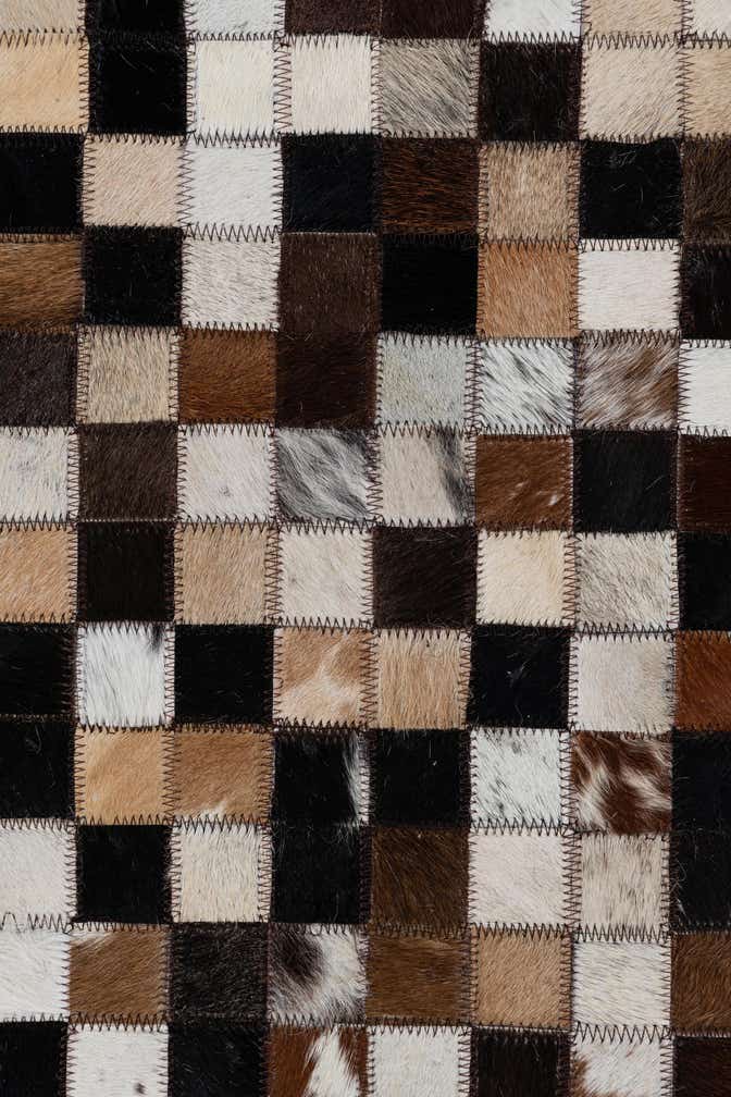 8' 1 x 9' 10 Cowhide Leather Rug