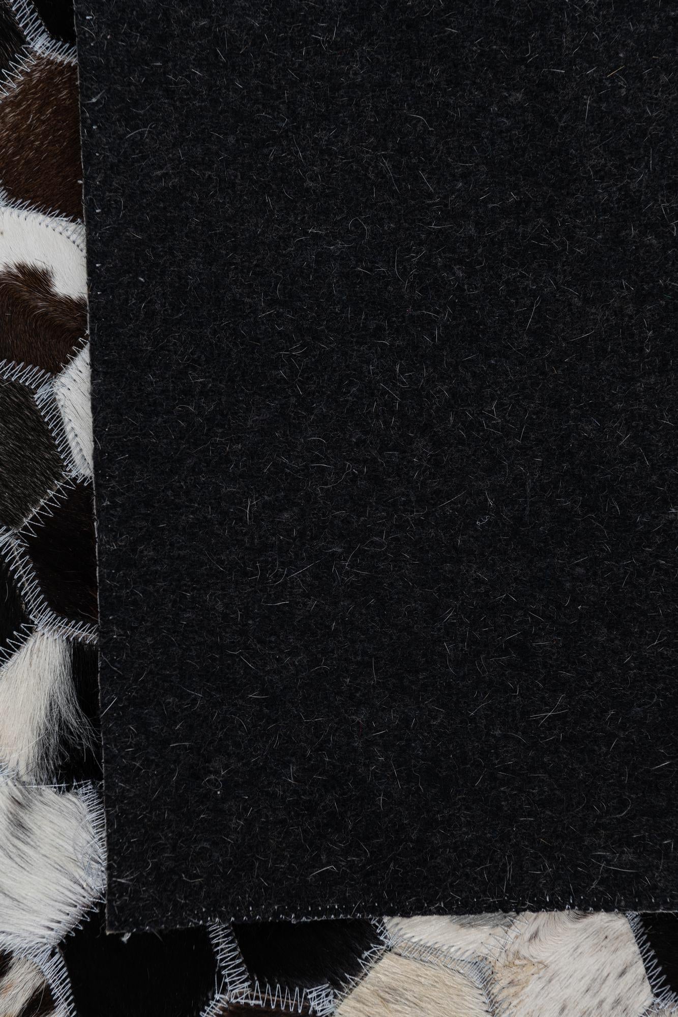 8' 1 x 10' Cowhide Leather Rug