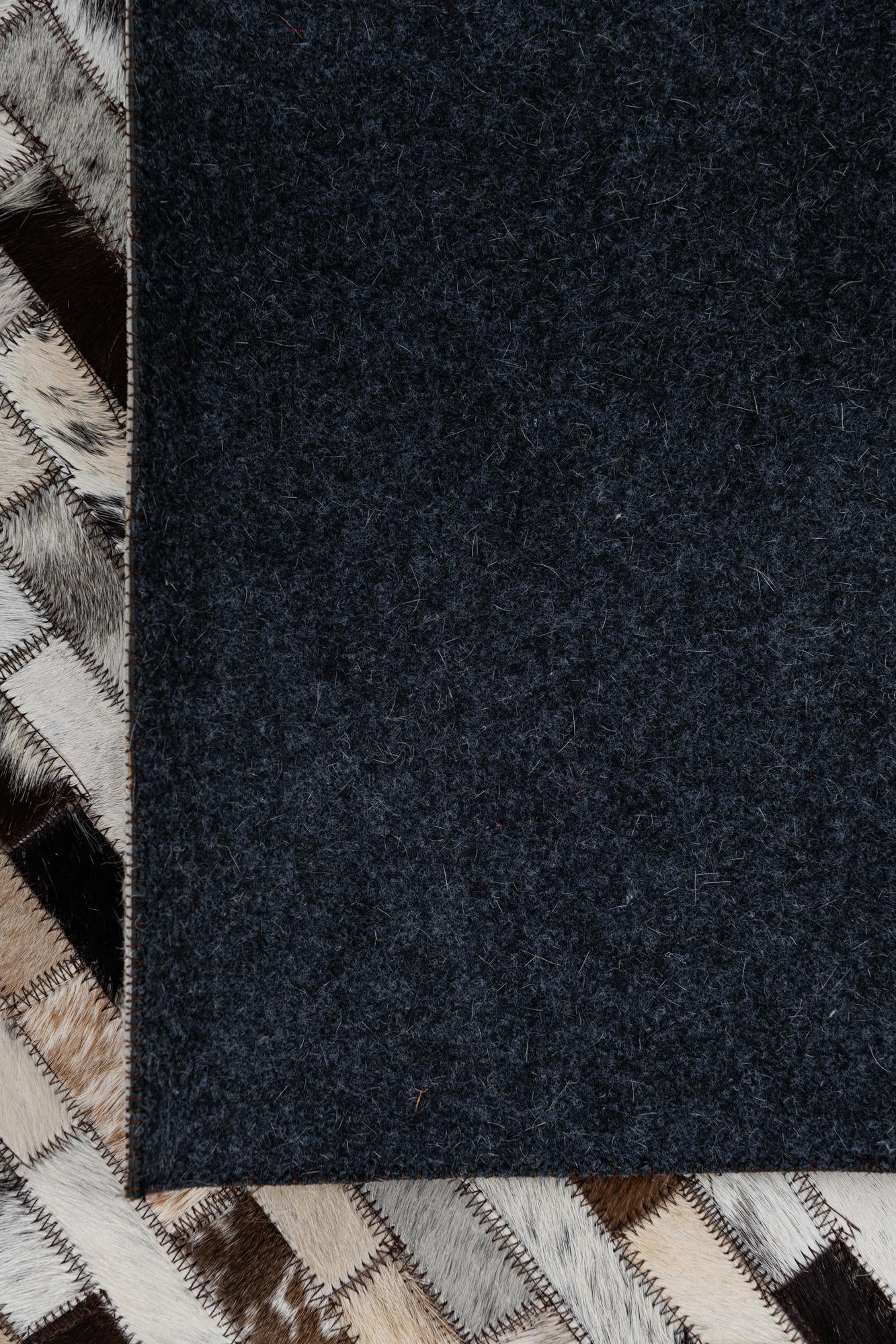 8' 1 x 9' 9 Cowhide Leather Rug