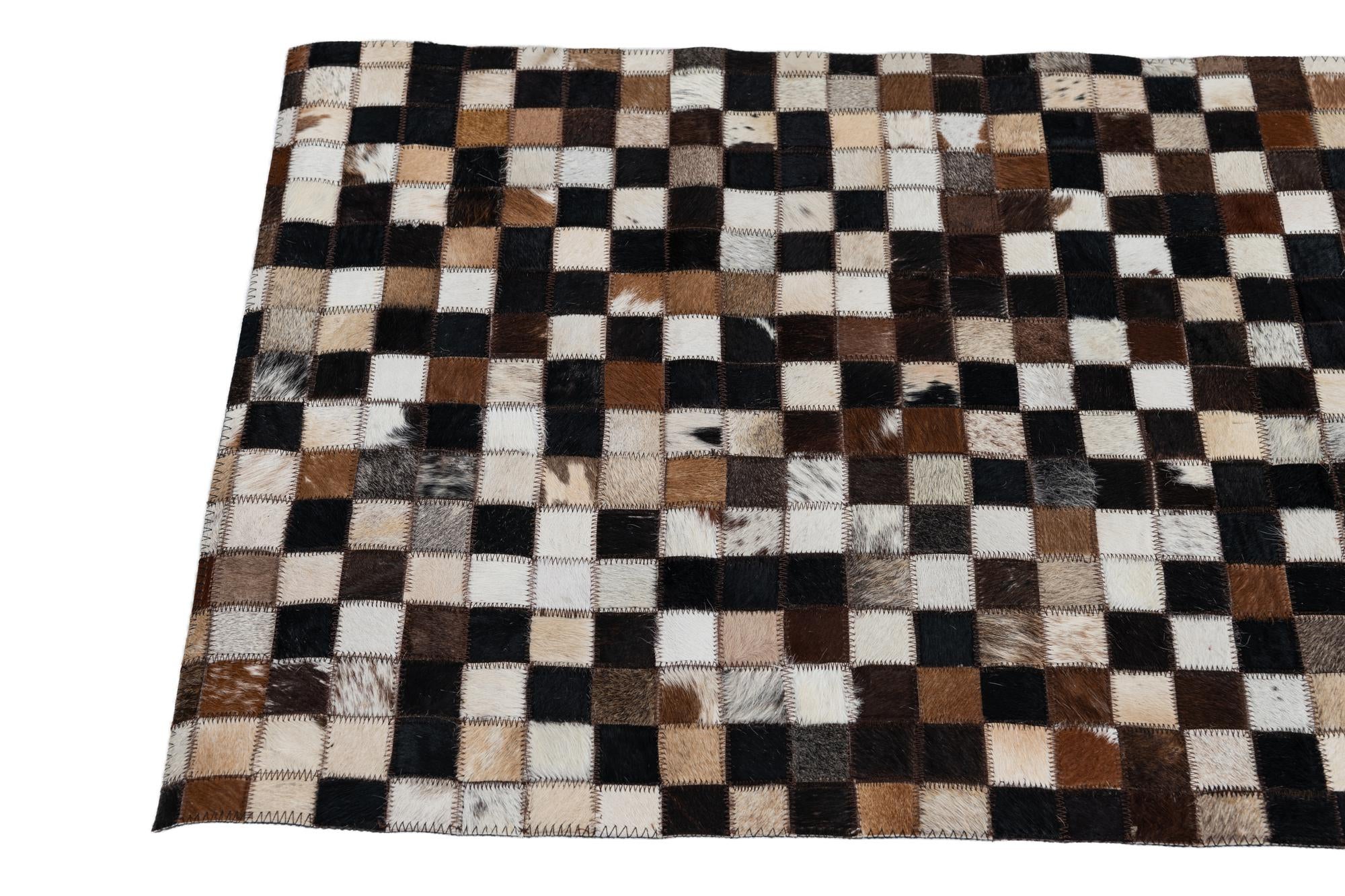2' 1 x 3' Cowhide Leather Rug