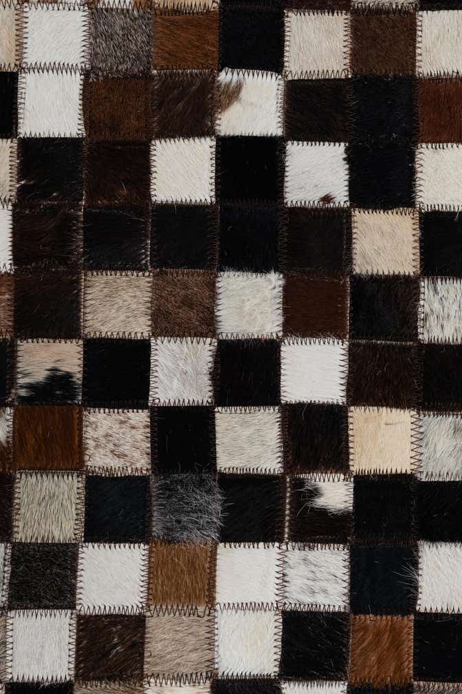 2' 1 x 3' Cowhide Leather Rug