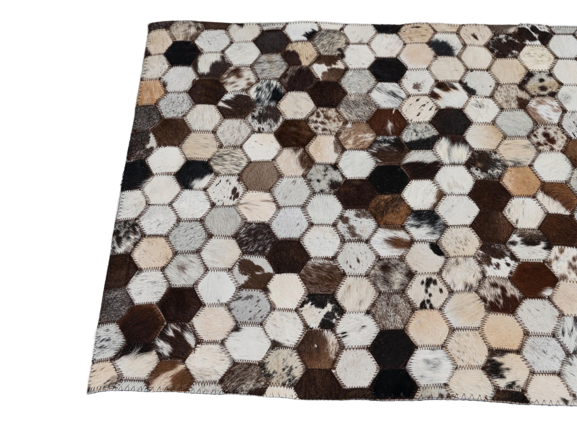 2' 1 x 3' Cowhide Leather Rug