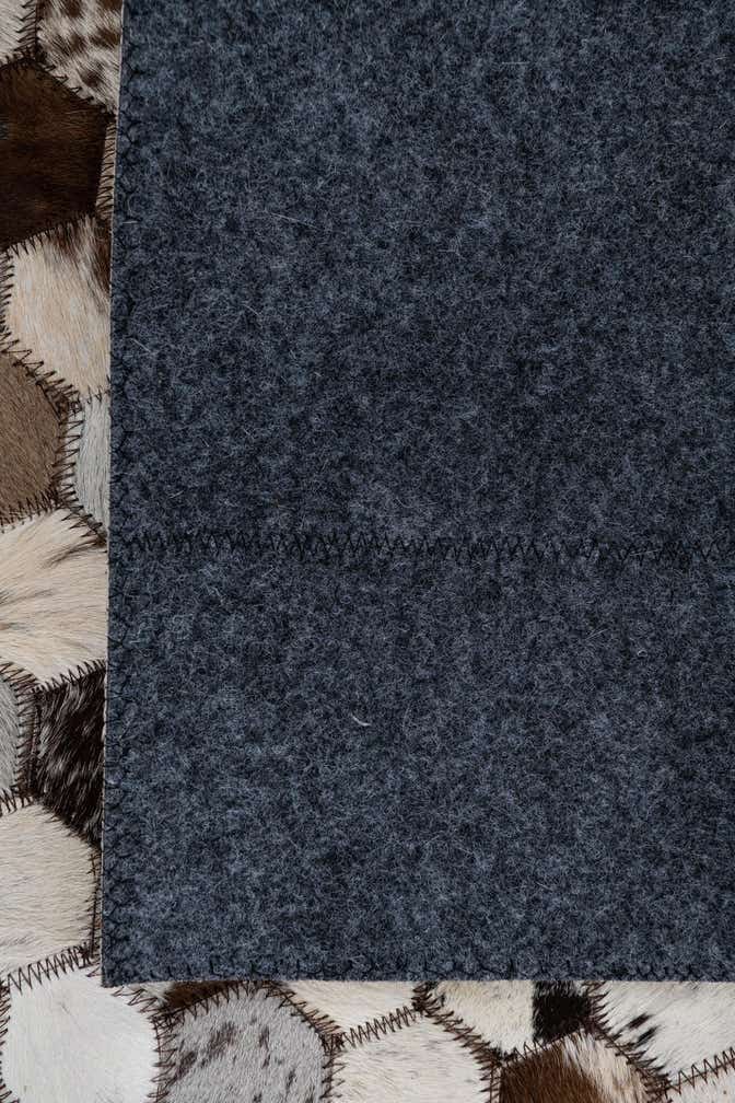 2' 1 x 3' Cowhide Leather Rug
