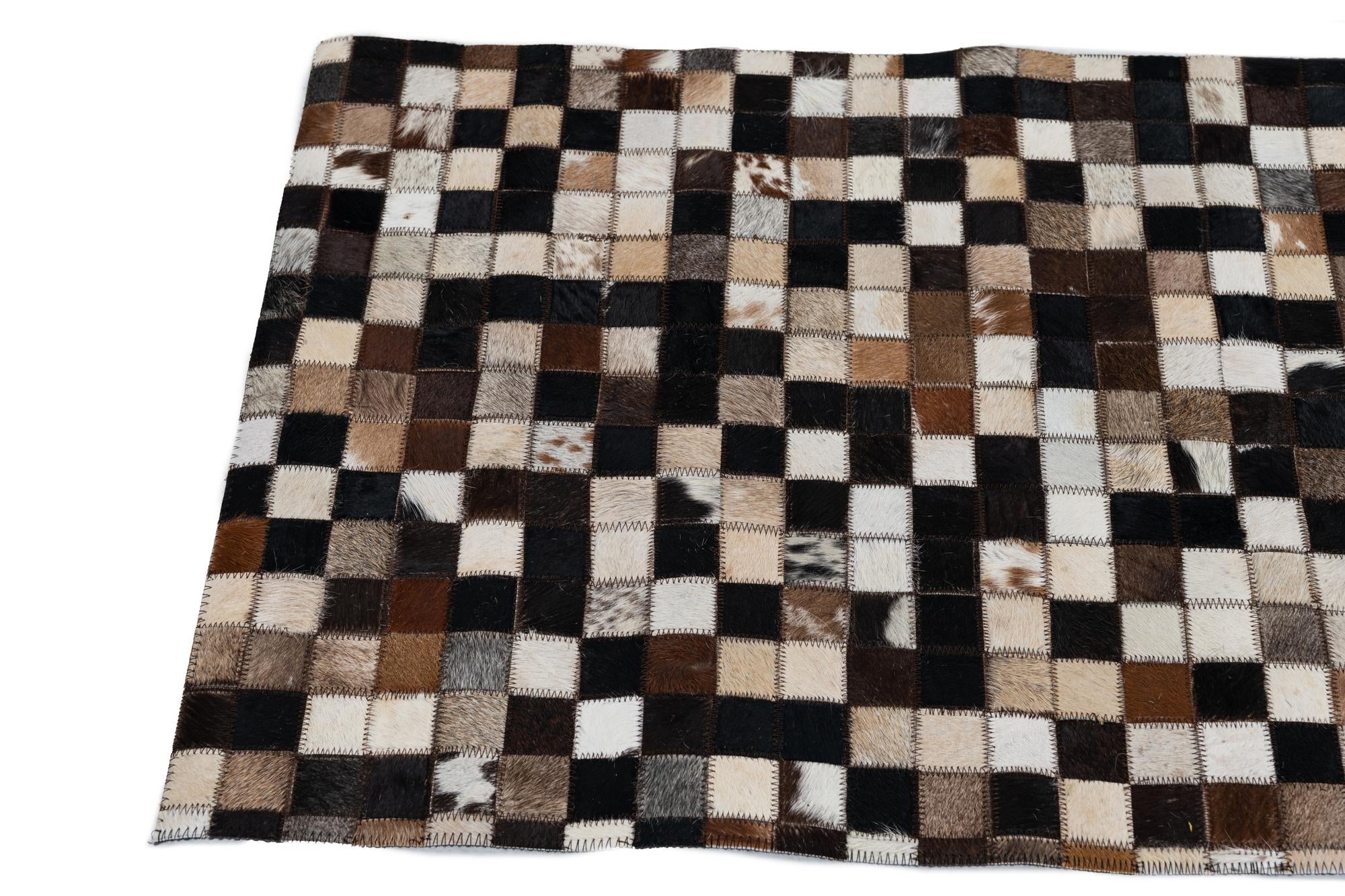 2' 1 x 3' Cowhide Leather Rug