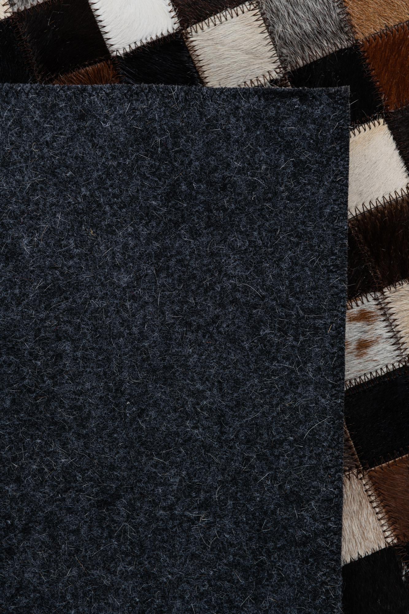 2' 1 x 3' Cowhide Leather Rug