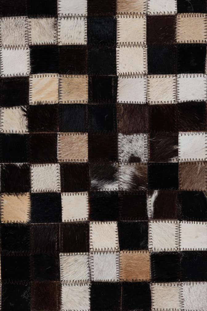2' 1 x 3' Cowhide Leather Rug