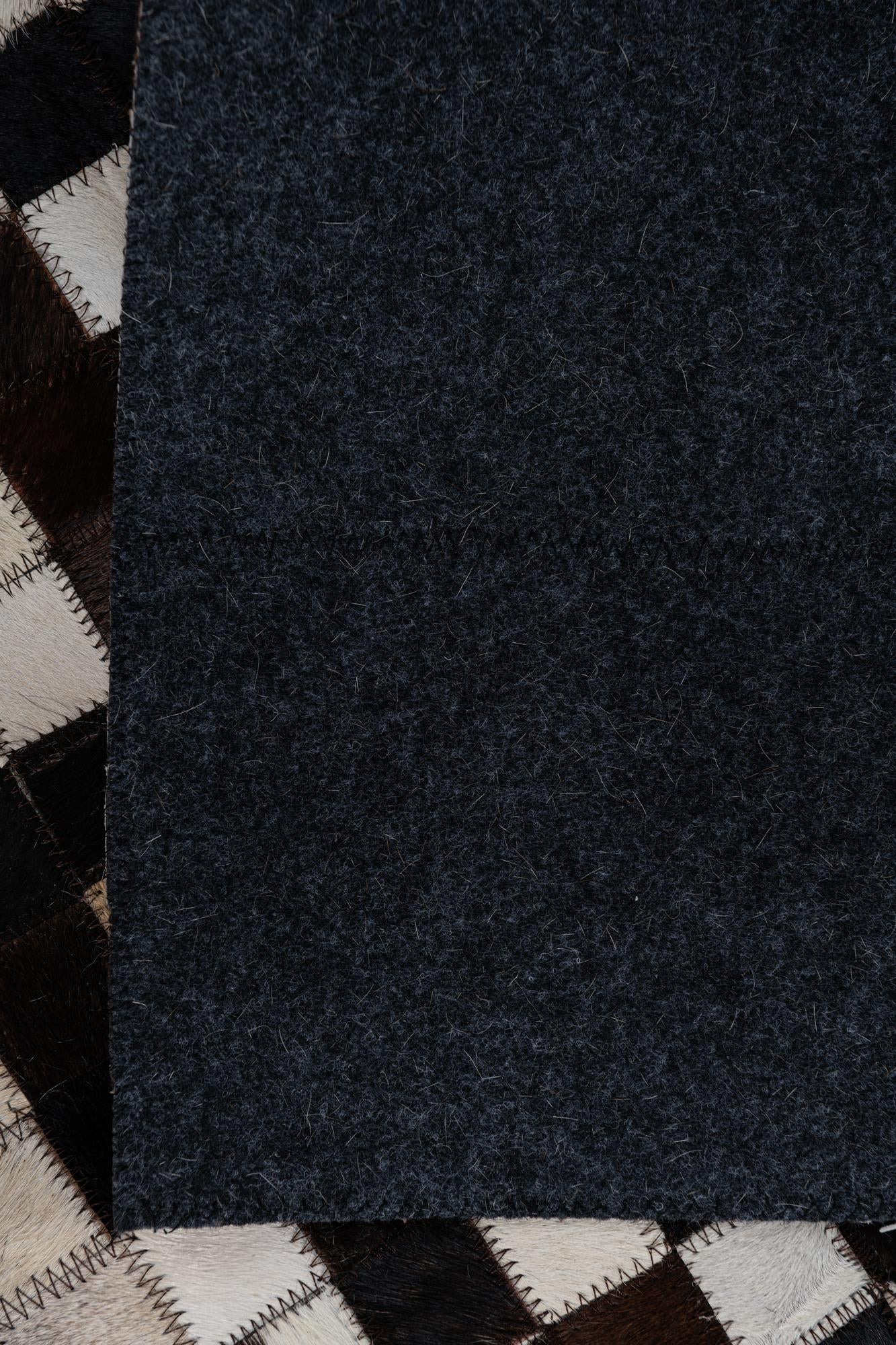 2' 1 x 3' Cowhide Leather Rug