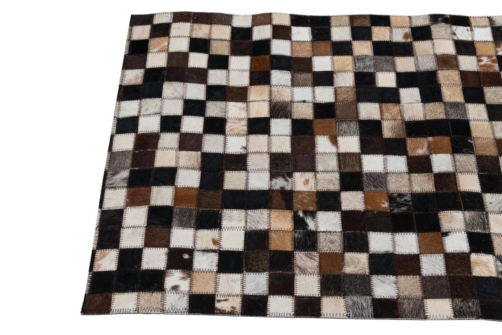 2' 1 x 3' Cowhide Leather Rug