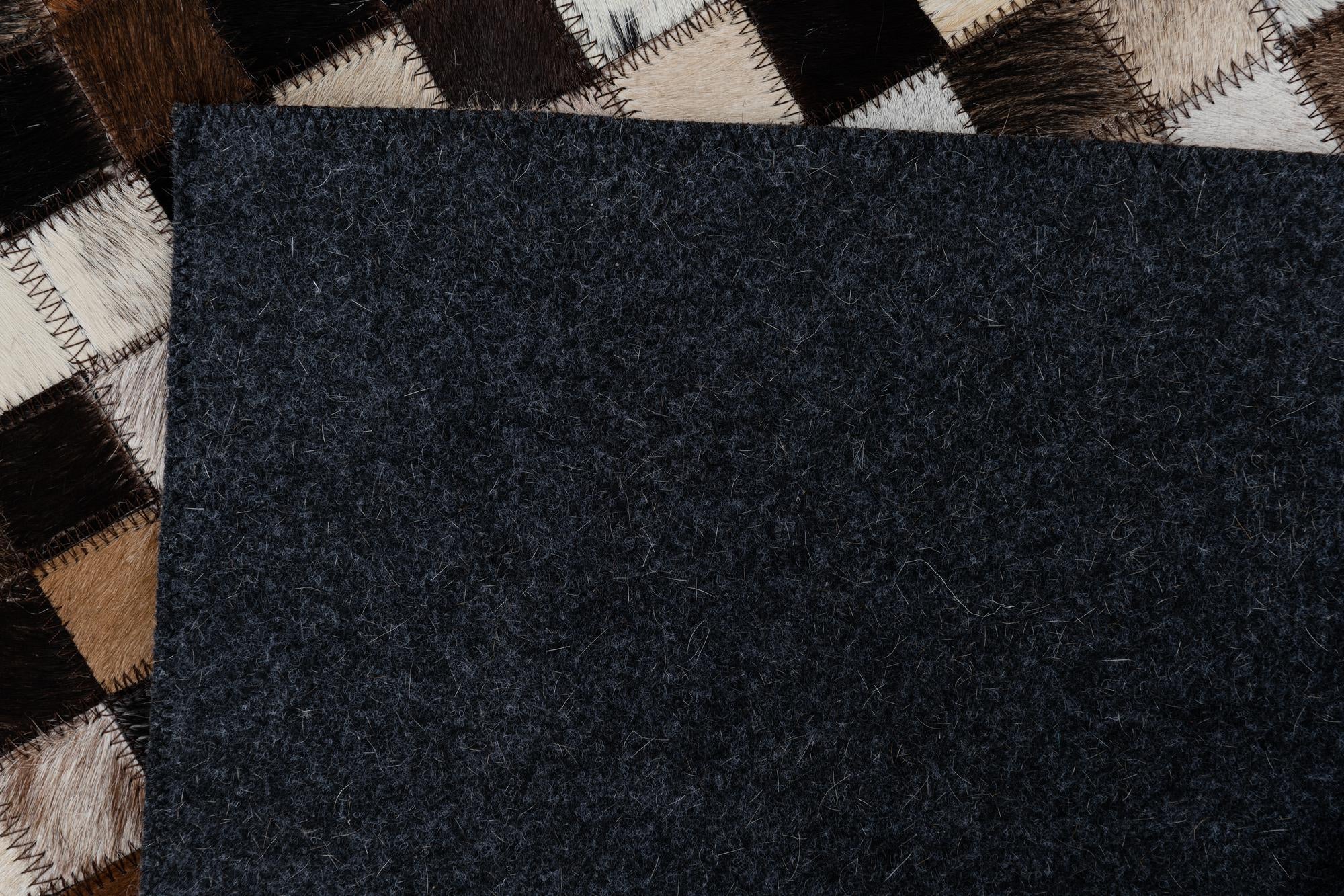 2' 1 x 3' Cowhide Leather Rug