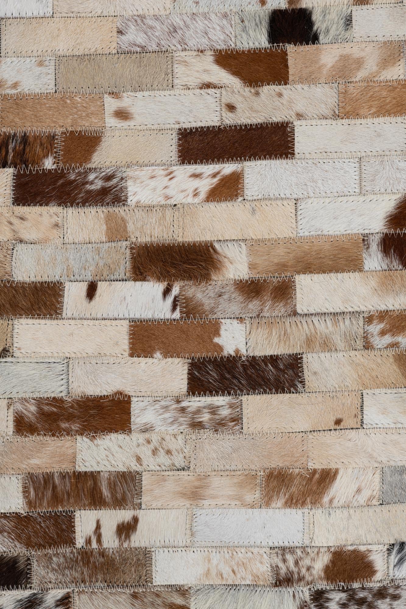 2' 1 x 3' Cowhide Leather Rug