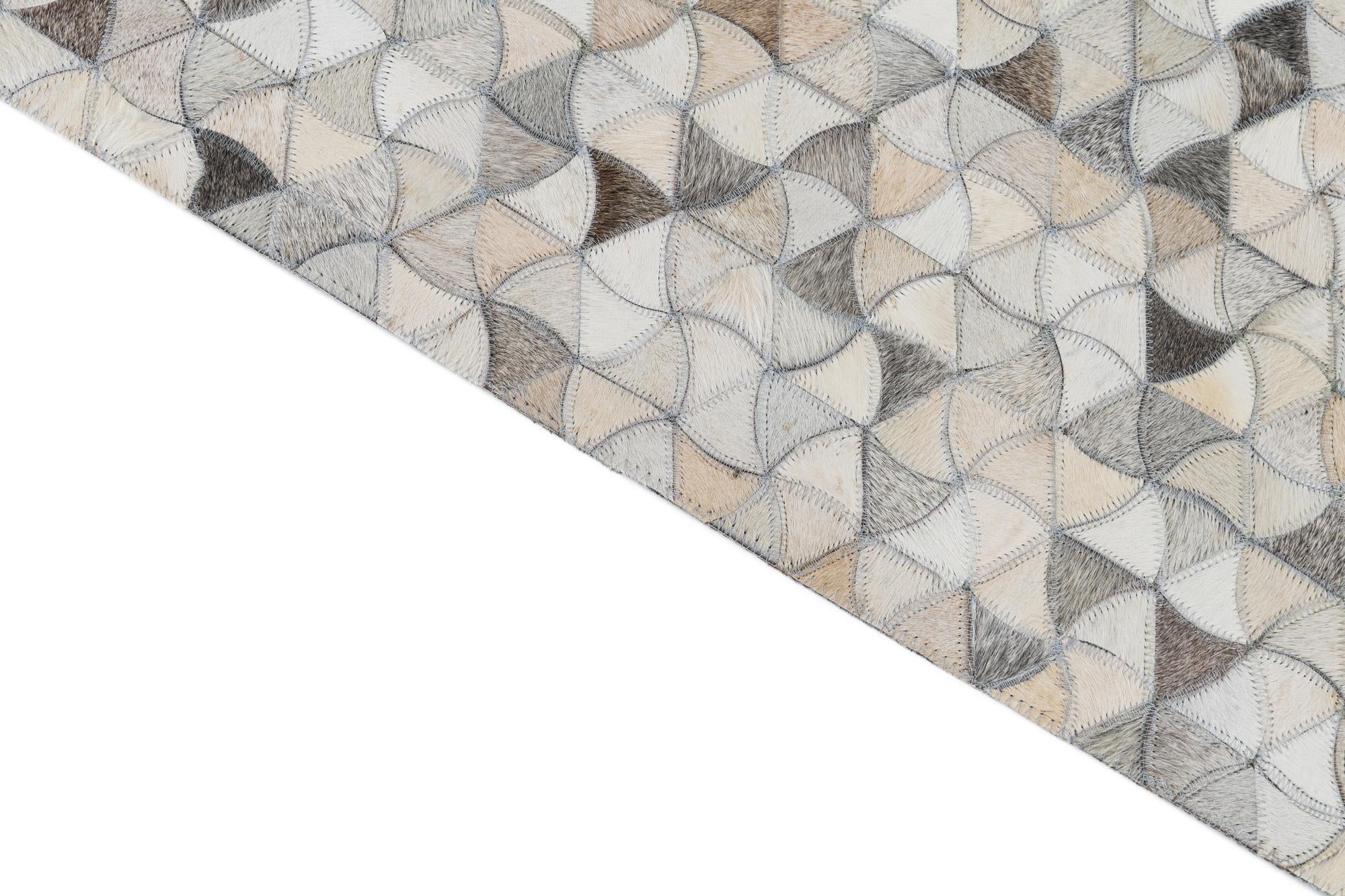 5' 2 x 7' 10 Cowhide Leather Rug