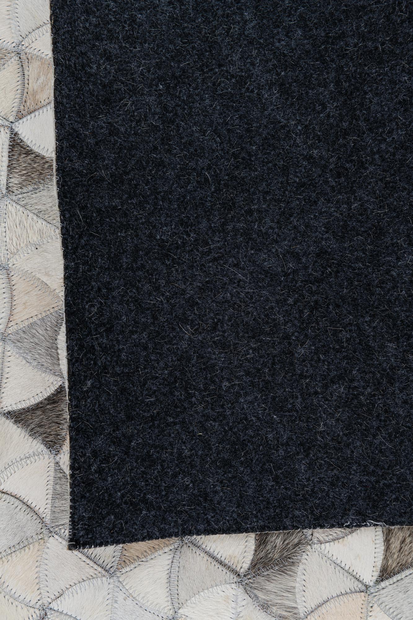 5' 2 x 7' 10 Cowhide Leather Rug