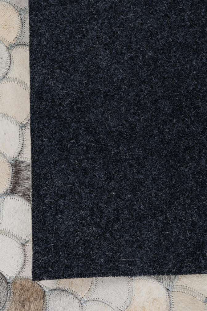 5' 1 x 8' 1 Cowhide Leather Rug