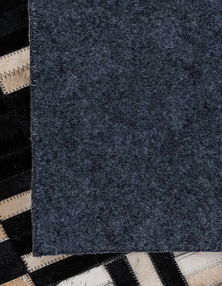 Detail image of 5' x 7' 10 Cowhide Leather Rug